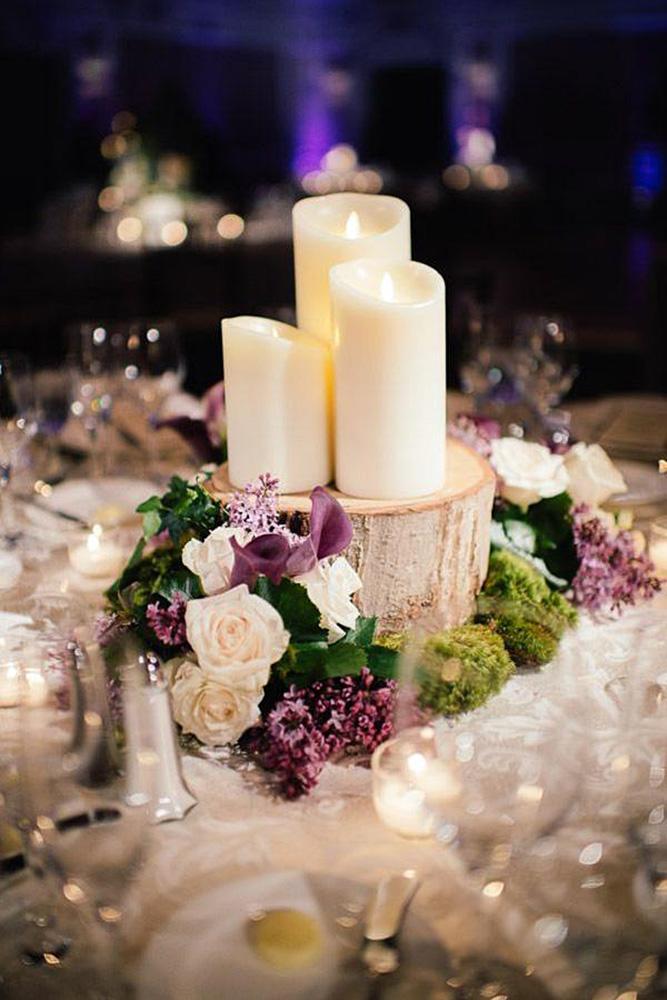 rustic wedding centerpieces three white candles on a wooden log eli turner studios