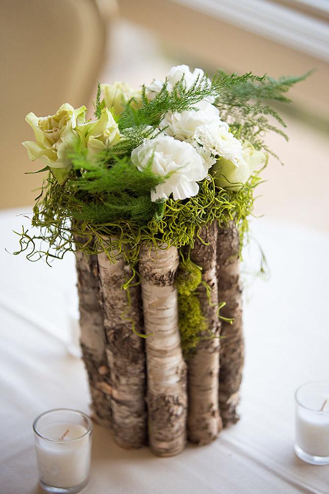 rustic wedding centerpieces white garden roses and moss in a stand made melissa maureen photography