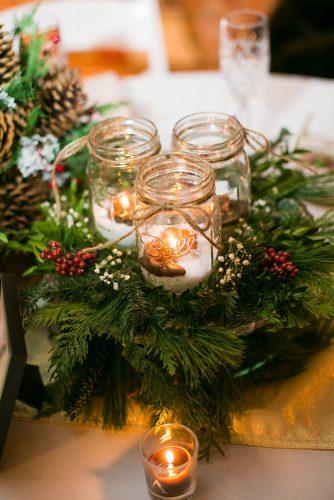 mason jars wedding centerpieces candles in mason jar fir branches winter reception decor tpoz photography