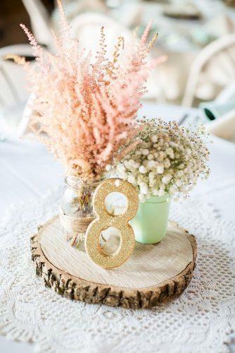 mason jars wedding centerpieces with baby breath and glitter tablenumber caynay photo
