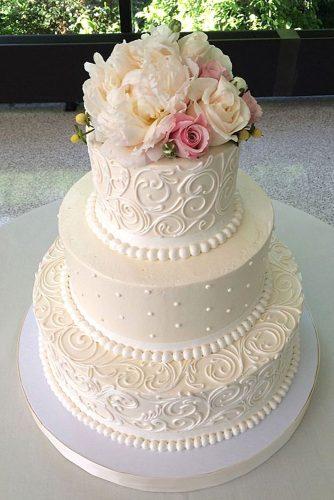wedding cake designers lace and flowers