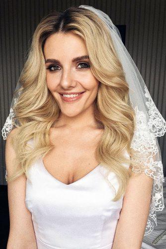 wedding hairstyles for long hair large wavy curls on blond hair xenia_stylist via instagram