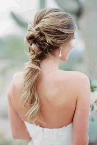 wedding hairstyles for long hair wavy ponytail with bun