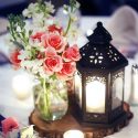 rustic wedding lanterns with a mason jar candle with pink roses blue martini photography