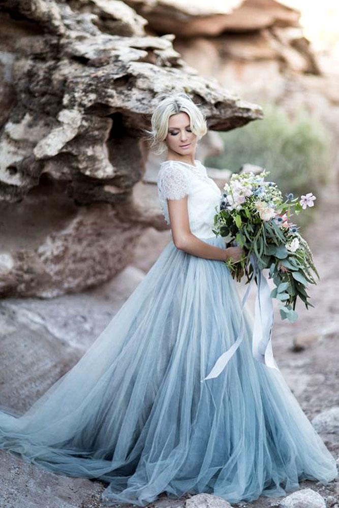blue wedding theme bride in blue dress on beach