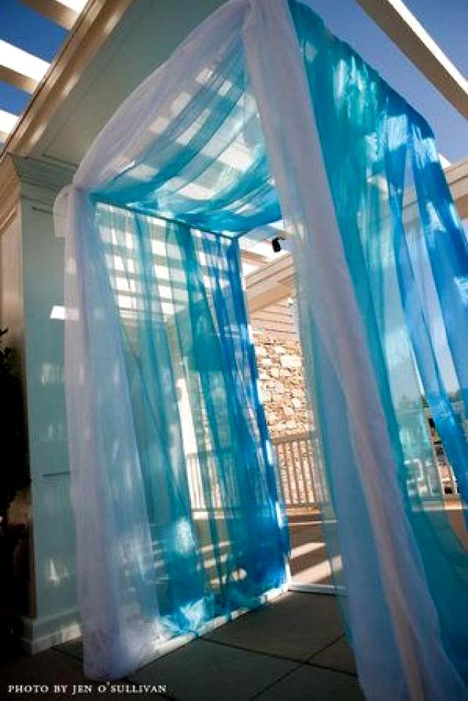 blue wedding theme different blue tulle entrances decor