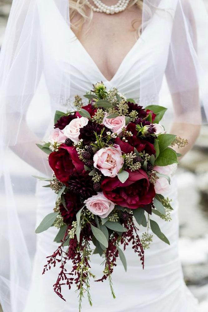 burgundy wedding bridal bouquet with peonies and tender roses