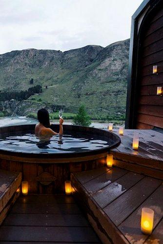 new zealand honeymoon spa hotel in new zealand girl in spa with candles