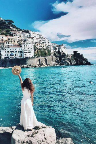 affordable honeymoon packages italy a girl on the beach wanderlust voyager via instagram