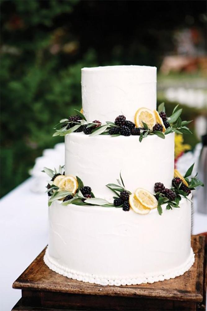 italian wedding cakes white italian cake with greenry and lemons shehult