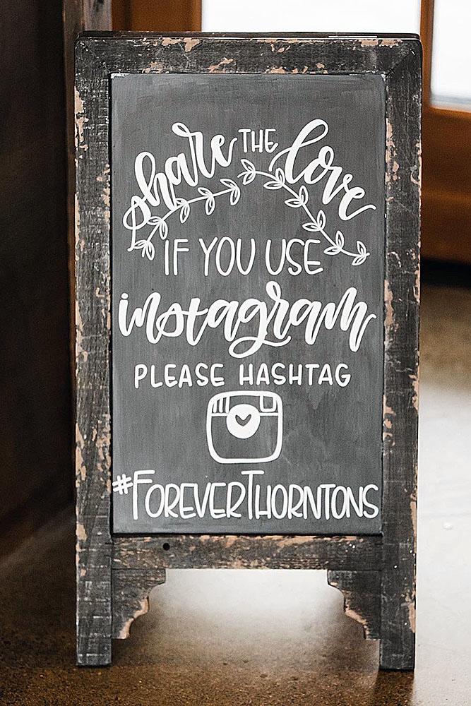 popular wedding signs on a black white letter in a wooden old frame ashlee phelps via instagram