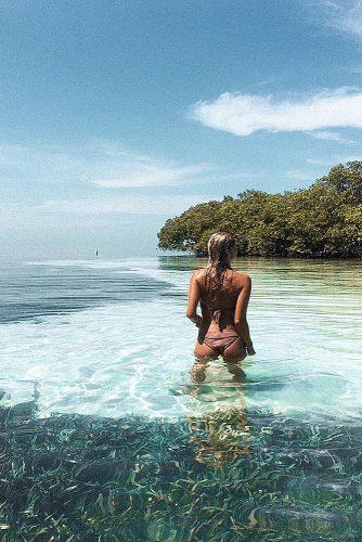 best honeymoon spots girl at the beach