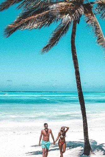 best honeymoon spots zanzibar couple at the beach