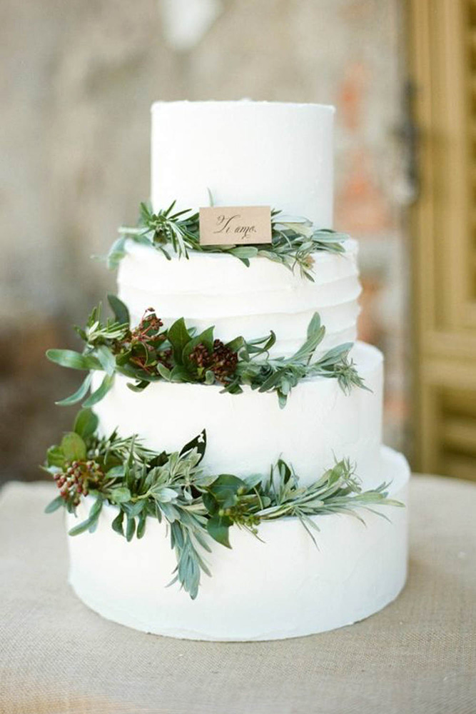 italian wedding cakes white decorated with greenery vierlieft photography