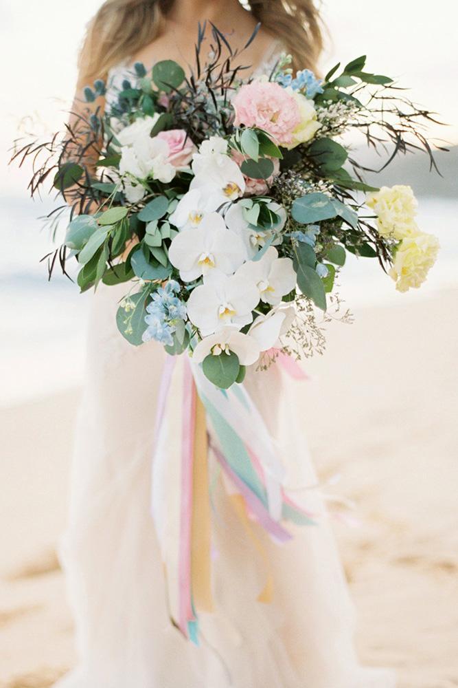 spring wedding bouquets fluffy with greenery and orchids with ribbons alice ahn