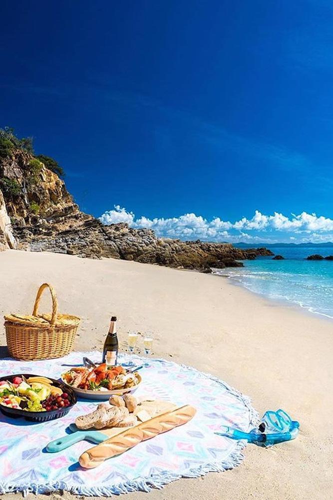 tropical honeymoon destinations a picnic on a beach in australia markfitz via instagram