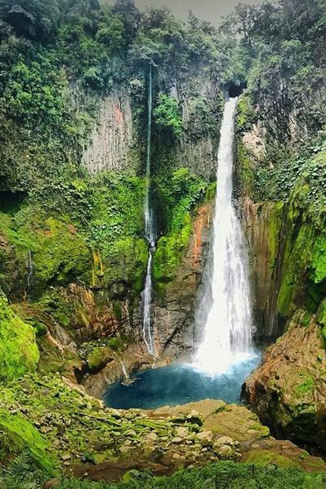 tropical honeymoon destinations costa rica a wonderful waterfall sara pat world travellers via Instagram