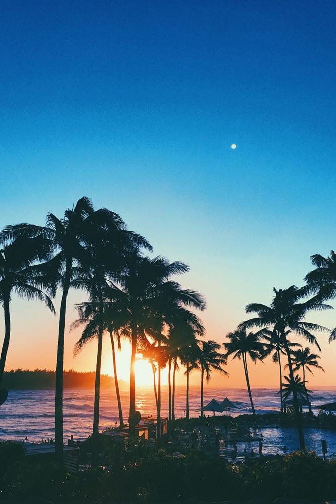 tropical honeymoon destinations havaii a sunset near the sea bobby bense via instagram