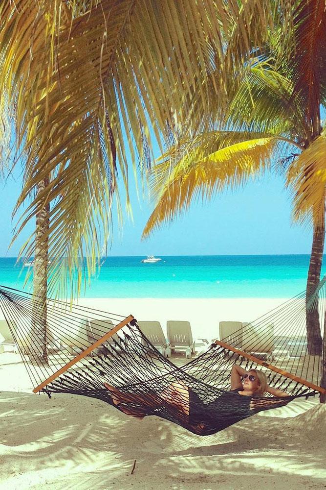tropical honeymoon destinations jamaica a hammock at the beach thecontinenthopper via instagram