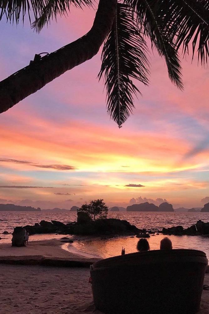 tropical honeymoon destinations thailand a couple at the sunset letstravel via instagram
