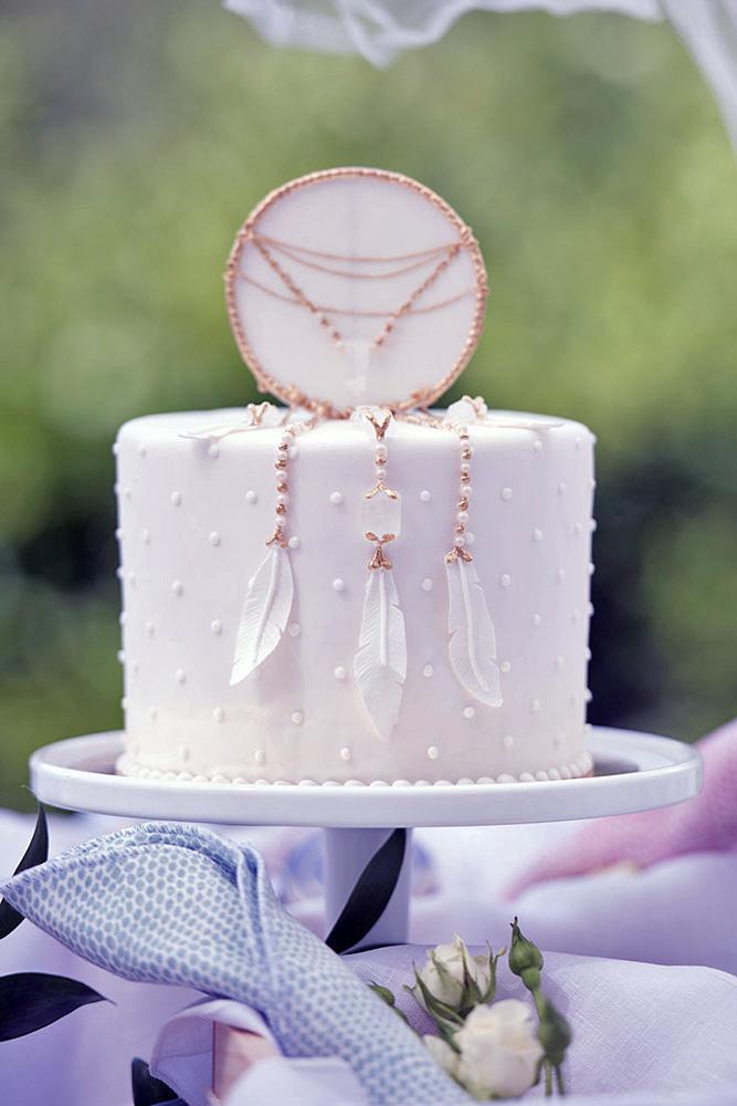 unique wedding cake toppers beautiful white cake with a top in the form of a dream catcher blush wedding photography