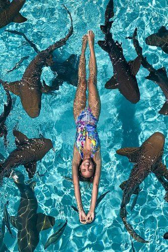 affordable honeymoon packages bahamas amazing view girl in the ocean with sharks