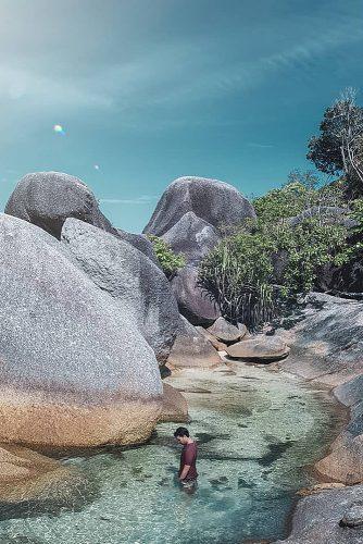 affordable honeymoon packages belitung island man in the water