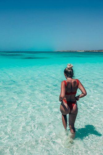 affordable honeymoon packages cook islands girl on the beach