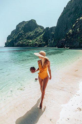 affordable honeymoon packages el nido philippines girl at the beach