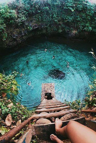 affordable honeymoon packages el nido philippines girl at the high point under water
