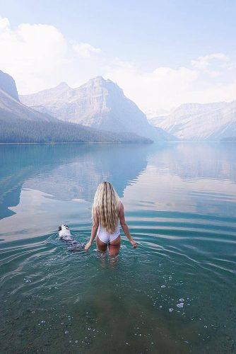 affordable honeymoon packages girl in the lake with dog rocky mountains colorado