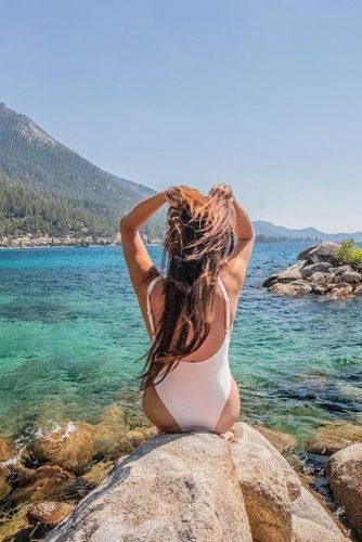 affordable honeymoon packages lake tahoe nevada girl sitting near water