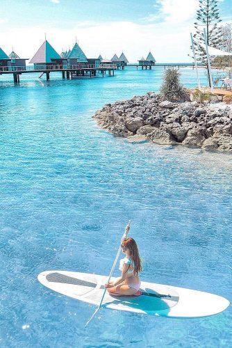 affordable honeymoon packages new caledonia girl on the serf board