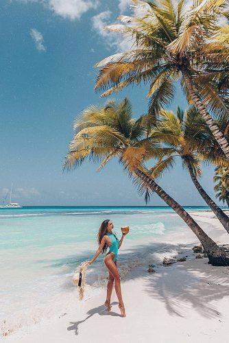 affordable honeymoon packages punta cana girl on the beach palms