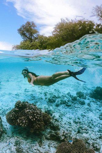 affordable honeymoon packages solomon islands girl diving