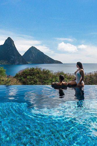 affordable honeymoon packages st lucia couple in the pool with beautiful view