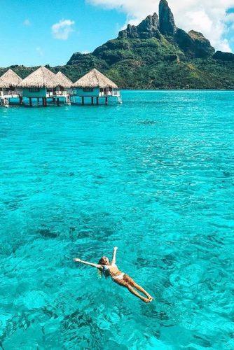 affordable honeymoon packages tahiti bungalos girl in the water