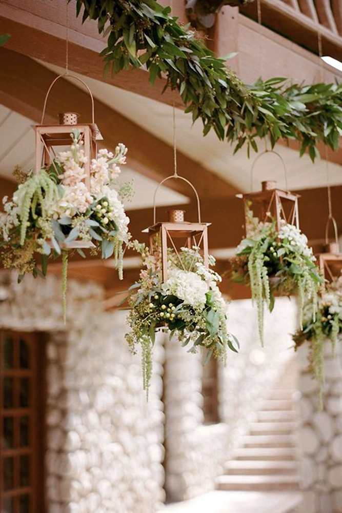rustic wedding lanterns metal golden lanterns with greenery and flowers rebecca yale photography