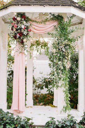 wedding ceremony decorations altar pink cloth and flowers jenna henderson photography