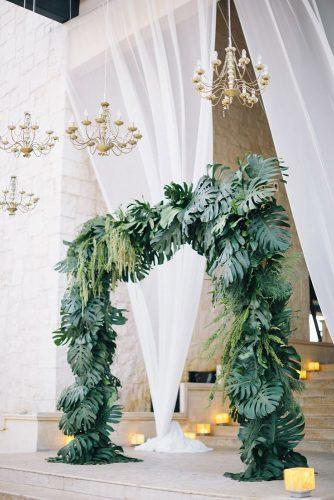 wedding ceremony decorations arch with tropical leaves erika layne