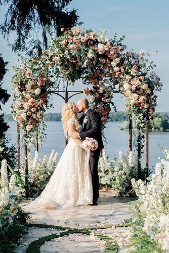 wedding ceremony decorations groom and bride summer altar with flowers lattedecor via instagram