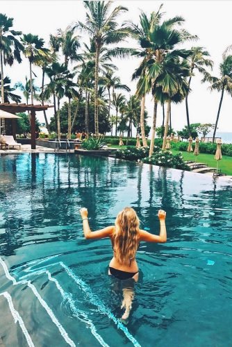 hawaii honeymoon girl walks into the pool jennafisch