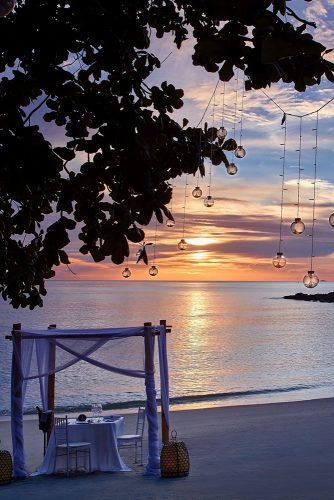 hawaii honeymoon sunset on the beach in a beautiful gazebo with lights ritzcarlton
