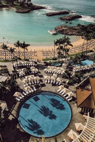 hawaii honeymoon view from the window on the round pool the sea and chaise lounges hillaryfolkvord