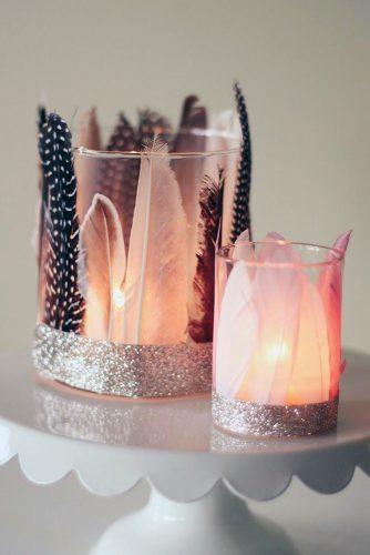 non floral wedding centerpieces candle in glass decorated with feathers ayseed home makin