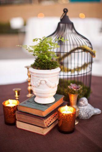 non floral wedding centerpieces with moss books and birdcage meg ruth