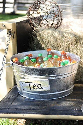 rustic barbecue bbq wedding bottles of tea in an iron bucket eureka photography