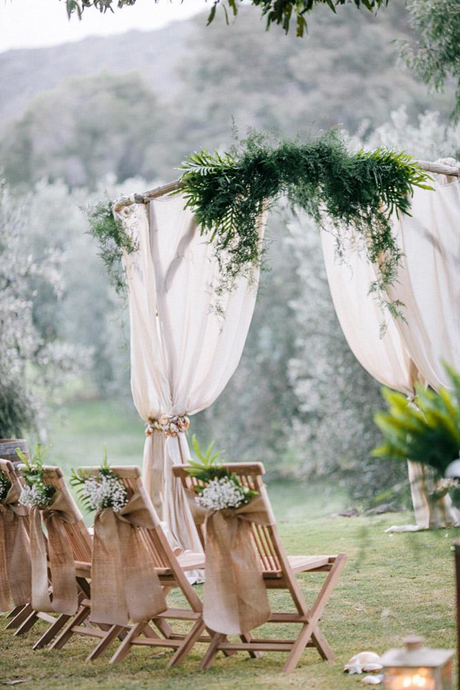 country wedding bridal ceremony decorated with burlap and greenery elizabeth anne designs