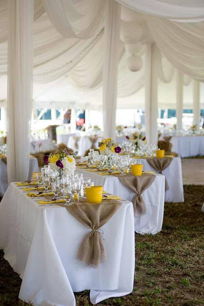 country wedding reception under white tent with gold accents janas corner