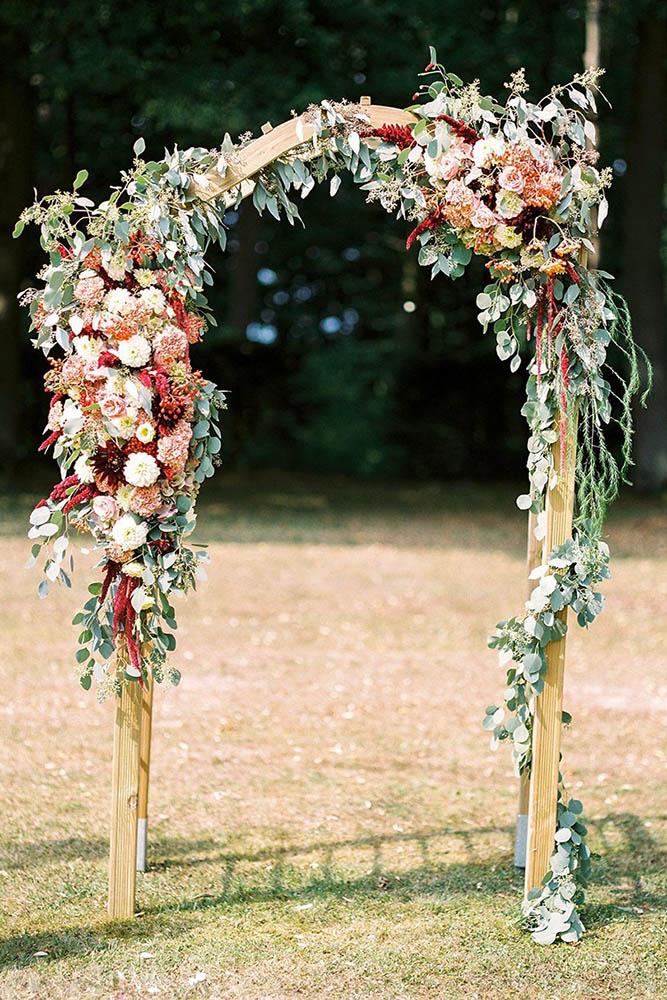 country wedding wooden arch decorated with flowers ashley ludaescher photography